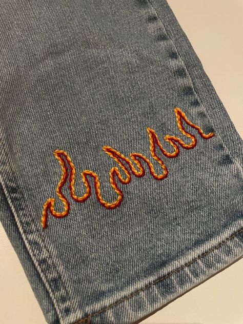 Cute Sewing Designs On Jeans, Things To Sew On Jeans, Flame Embroidery Jeans, Cool Embroidery Designs On Jeans, Embroidery Stitches On Jeans, Embroidery Designs On Jeans Pants, Cute Embroidery On Jeans, Small Embroidery Designs On Tshirt, How To Customize Jeans