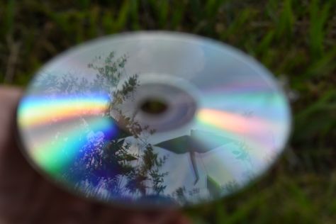 Sky, Tree and Origami through CD reflection Reflection Photography Ideas At Home, 2 Faced Drawing, Shiny Photography, Cd Photography, Reflective Photography, Objects Photography, Distortion Photography, A Level Photography, Reflection Photos