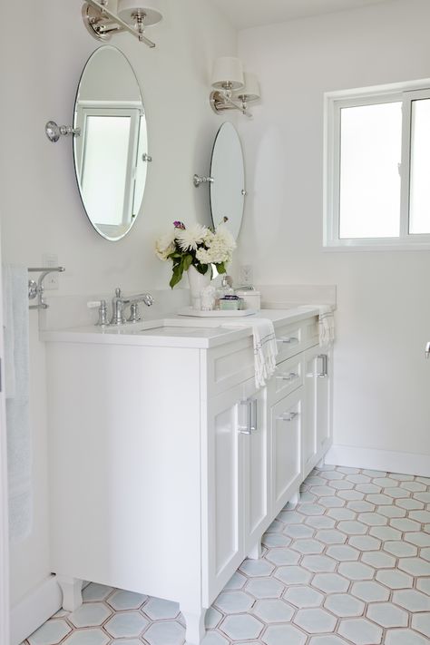 This bathroom was made for me! honeycomb floor tile in the perfect neutral bluish-grey color, white vanity, marble countertop, and duel sinks... It's perfection! This is also exactly how my master is set up, the window and everything!! Grey Hexagon Tile Bathroom, Bathroom With White Vanity, White Hexagon Floor, Blue Hexagon Tile, Tile Grout Color, Hexagon Tile Bathroom, Floor Tile Grout, Gray Hex, Bathroom Gray