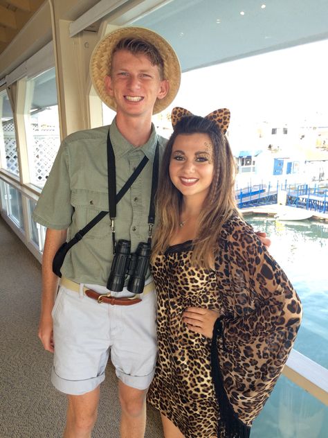 Cheetah and safari tourist Halloween costume Wildlife Explorer Costume, Hunter And Cheetah Costume, Cougar Hunter Halloween Costume, Cheetah And Safari Couple Costume, Safari Explorer Costume Woman, Tiger And Zoo Keeper Costume, Animal Couples Costume, Cheetah And Hunter Couple Costume, Jungle Theme Halloween Costume