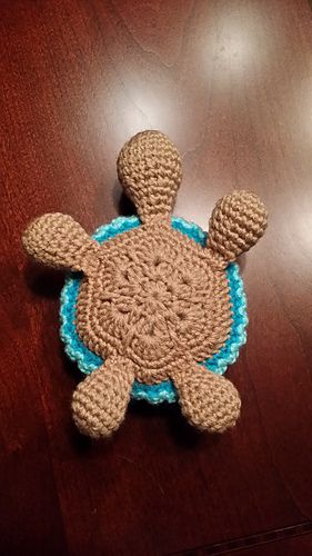 ...Press opening flat with your fingers and close the 2 sides with 3 sc across the opening. <span class="best-highlight">Leave a long tail for</span> sewing to the body. Baby Turtle Head: Rnd 1: 6 sc in a “magic... Crocheted Turtle, African Flower Crochet Animals, Crochet Turtle Pattern, Crochet African Flowers, Crochet Turtle, Crochet Animals Free Patterns, Turtle Pattern, African Flowers, Crochet Amigurumi Free Patterns