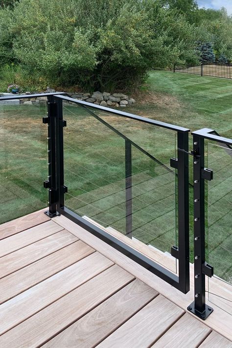 Glass rail with a gate creates a beautiful enclosed deck. Glass Railing Ideas Outdoor, Glass Porch Railing, Glass Railing Outdoor, Handrail Design Outdoor, Glass Railing Stairs Outdoor, Plexiglass Deck Railing, Terrace Handrail Design, Patio With Railing, Glass Deck Railing Ideas