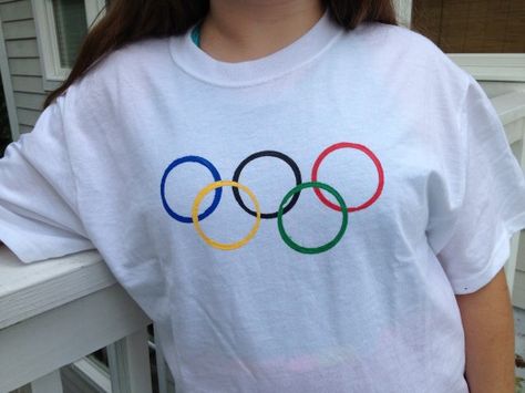 Is your family getting ready to watch the Olympics?  Follow these step-by-step instructions on how to make awesome Olympic Rings T-Shirts.  You kids will love making and wearing these crafty shirts! Sport Crafts For Kids, Summer Olympics Activities, Sport Crafts, Olympic Idea, Kids Olympics, Olympic Crafts, Olympics Activities, Olympic Theme, Olympic Party