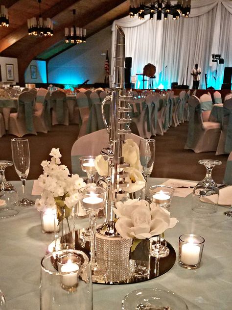 Instrument centerpieces for a music inspired tiffany blue, white and silver. Musical Instrument Centerpieces, Instrument Centerpieces, Tiffany Blue, Musical Instrument, Wedding Theme, Table Settings, Musical, Blue White, Table Decorations