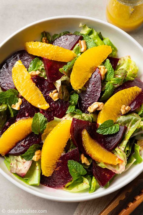 This roasted beet and orange salad features roasted beets and fresh oranges arranged on a bed of mixed greens. It is then brightened with an easy and refreshing orange vinaigrette. Orange Salad Recipes, Asian Steak, Asian Steak Bites, Orange Vinaigrette, Beet Salad Recipes, Roasted Beet Salad, Citrus Vinaigrette, Eat Fresh, Vinaigrette Recipe