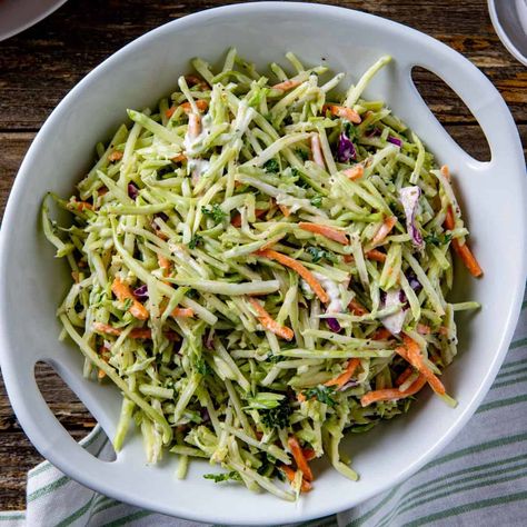 Crispy broccoli slaw is tossed with avocado oil mayo, apple cider vinegar, and seasonings for a deliciously healthy side dish or a crunchy filling for sandwiches. Homemade Banana Nut Muffins, Broccoli Slaw Dressing, Broccoli Slaw Recipe, Broccoli Slaw Recipes, Crispy Broccoli, Avocado Oil Mayo, Slaw Recipe, Delicious Seafood Recipes, Broccoli Slaw