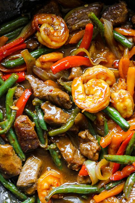 Savor the perfect blend of tender steak, succulent shrimp, and crisp veggies, all coated in a rich, savory-sweet sauce. This quick and easy stir-fry will elevate your weeknight dinner game—ready in just 30 minutes and bursting with flavor! Steak Shrimp Stir Fry, Steak And Shrimp Stir Fry, Steak Stirfry Recipes, Brunch Sandwich, Coconut Curry Shrimp, Steak Stir Fry, Beef Short Rib Recipes, Salmon Rice Bowl, Stir Fry Ingredients