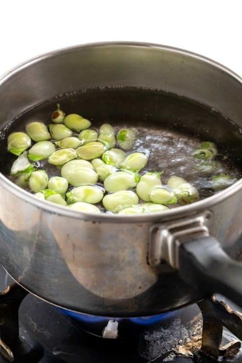 Learn how to cook fava beans using the blanching method. Check out this step-by-step guide for how to remove them from their pod, cook, and peel. #favabeans #beans #howtocook #sidedish Faba Beans Recipes, How To Remove Gas From Beans, Remove Gas From Beans, How To Cook Dry Beans Fast, Fresh Fava Bean Recipe, How To Cook Fava Beans, Growing Fava Beans, Fava Beans Recipes, Bean Pods