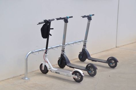 Scooter Rack | Parking lot for scooters Electric Scooter Storage Garage, Electric Scooter Storage, Scooter Rack, Scooter Parking, Scooter Store, Scooter Storage, Scooter Rental, Bicycle Rack, Bicycle Parking