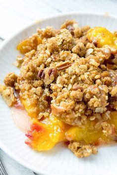 This Peach Crisp is wonderfully delicious with slices of fragrant, juicy, ripe peaches and a crunchy, sweet topping of brown sugar, oatmeal, and pecans Peach Oatmeal Crisp, Heart Healthy Recipes Breakfast, Peach Oatmeal, Oatmeal Crisp, Peach Crisp Recipe, Pecan Crumble, Brown Sugar Oatmeal, Peach Dessert, Peach Dessert Recipes