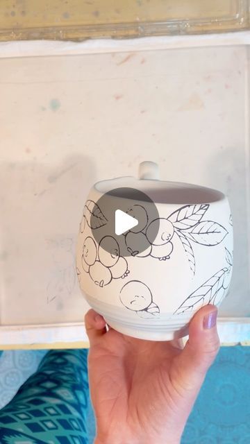 Shawna Pincus on Instagram: "Printing a blueberry mug in real time for this #mugmonday 🫐  I’m busy getting all the pots ready for @flowermartbmore in a few weeks! Get ready for lots of flowers, fruits, veggies, garden friends and baltimore themed pots! Woo-hooo!!! I can’t wait!  . . . #screenprintingonclay #muglove #mug #blueberries #illustratedceramics #newwork #handbuiltceramics #pottery #springvibes" Flower Mug Pottery, Veggies Garden, Garden Friends, Hand Painted Pottery, Painted Mugs, Spring Vibes, Pottery Bowls, Pottery Mugs, Pottery Painting