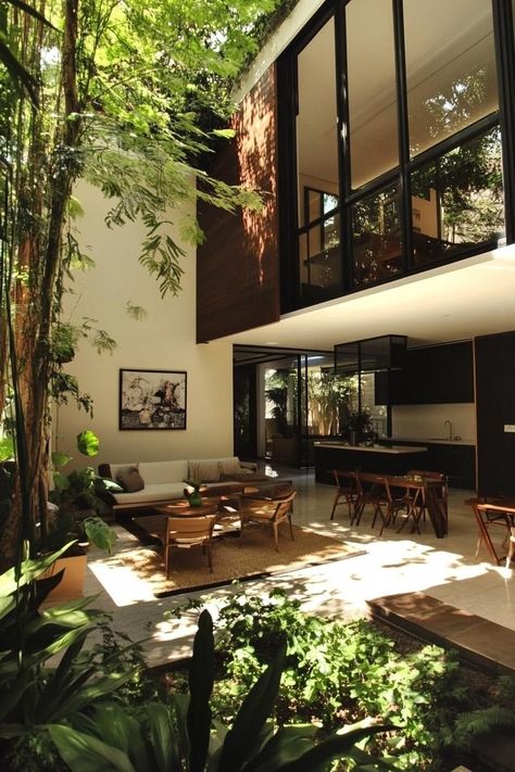 Modern House Greenery, Garden In House Design, Center Garden House, Connected Houses Architecture, House With Garden Inside, Modern Houses With Plants, Atrium Garden Architecture, Indoor Atrium Garden, House With Two Entrances