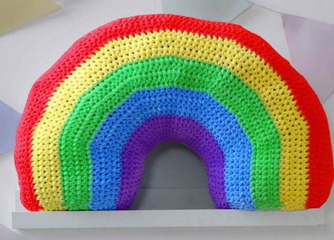 Free Crochet Pattern for a Rainbow Pillow.Skill Level: EasyWhen making a toy or accessory which needs to be stuffed, it is better to make the fabric tighter than you would for a garment or blanket. This way the stuffing will be less likely to show through your stitches.Free Pattern Crochet Rainbow Amigurumi Free Pattern, Rainbow Pillow Crochet Pattern, Crochet Rainbow Pillow Free Pattern, Crochet Rainbow Pillow, Crochet Kingdom, Crochet Free Patterns, Yarn Basket, Pillow Crochet, Rainbow Pillow