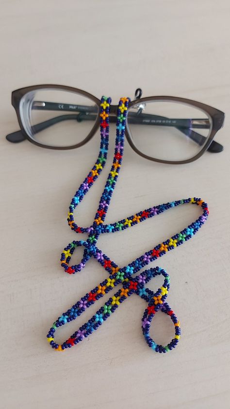 "You can always wear it easily.  You can use it not only as eyeglass chain, but also as a necklace and bracelet with rainbow colors.  Measures approx. 28\" (71 cm) total length Rainbow sunglasses necklace will be a perfect gift for yourself and your loved ones.  The price is for 1 piece of eyeglass necklace with black background. I can make it in any color you want. Please contact me. Thank you for visiting my store." Pride Sunglasses, Eyeglasses Lanyard, Boho Glasses, Beaded Glasses, Glasses Necklace, Sunglasses Necklace, Rainbow Sunglasses, Diy Jewelry Making Tutorials, Eyeglass Necklace