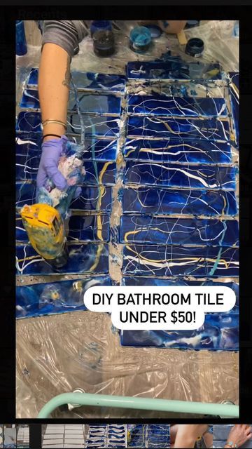 Ann Upton Art on Instagram: "DIY custom bathroom tile for under $50!! ✨ I love sharing this old project because it is one of those DIY ideas that truly helped save our family money, and is a permanent piece of functional art. These were installed in my son’s bathroom when we built our home three years ago, and they look just as beautiful today as they did when I made them, thanks to some of these important steps: ✨ -Use @counterculturediy resin and pigments, avoid a lot of white to help with any Resin Tiles Diy, Resin Tiles, Bathtub Makeover, Bathroom Tile Diy, Epoxy Tables, Functional Artwork, Family Money, Diy Resin Projects, Diy Tile