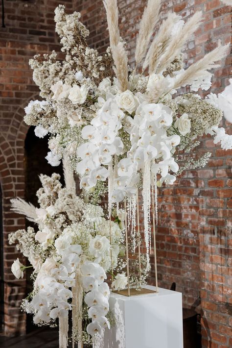 Baby's Breath, Orchids & Pampas Grass Arrangement Pampas Grass Arrangement, Foundry Wedding, Manhattan Wedding, Grass Wedding, Wedding Money, Long Island Wedding, Modern Flower Arrangements, Wedding Inside, White Wedding Bouquets