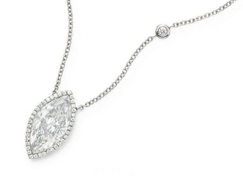 A DIAMOND PENDANT NECKLACE Suspending a marquise-cut diamond, weighing approximately 6.29 carats, within a circular-cut diamond surround, from a fine link platinum chain, with collet-set diamonds, mounted in platinum, 16 ins. Stud Earring Storage, Beautiful Jewelry Diamonds, Diamond Bling, Platinum Chain, Diamond Heart Pendant Necklace, Marquise Diamond Ring, Simple Diamonds, Heart Pendant Diamond, Modern Necklaces