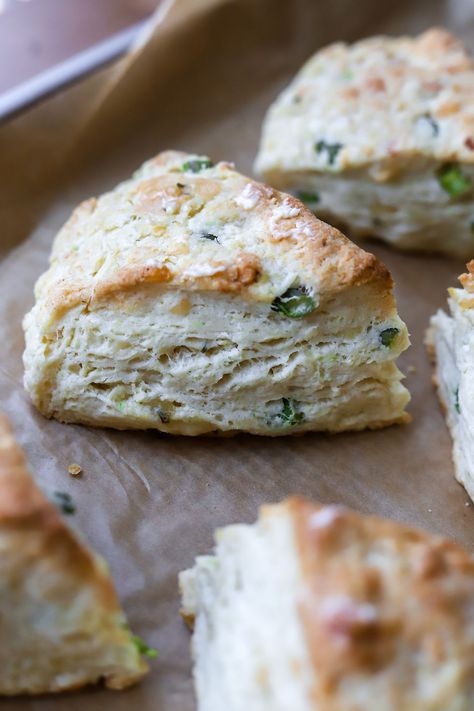 Cheddar + Garlic Scape Scones Garlic Scapes, Box Grater, All Purpose Flour, White Cheddar, Garlic Salt, Cake Flour, Whole Milk, Parchment Paper, Stick Of Butter