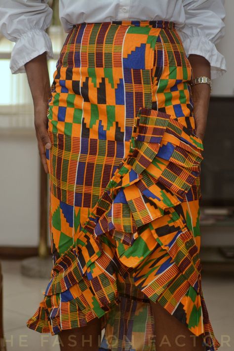 Our Ankara frill skirt with the latest kente skirt design is the perfect fit for your wardrobe. Wear this kente skirt style with a white button down blouse or shirt and heels for a ankara day at work. Price: 4,500 naira / $13. Available sizes Uk/US: 8, 10, 12, 14, 16, 18, 20 Kente Skirt, Modest Dresses Fashion, African Skirts, Fashion Traditional, Frill Skirt, Latest Ankara Styles, African Fashion Traditional, Skirt Style, Fashion Group