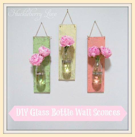 Huckleberry Love: DIY Glass Bottle Wall Sconces Snapple Bottle Crafts, Glass Bottle Wall, Coke Bottle Crafts, Glass Coke Bottles, Glass Bottle Diy, Diy Glass Bottle Crafts, Bottle Wall, Diy Bottle Crafts, Glass Bottle Crafts