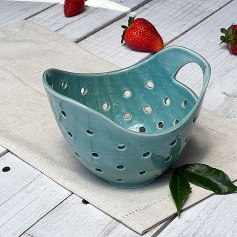 Turquoise Treasure Berry Bowl; Super beautiful, clean, useful, unique and handmade. Clean 'em up, drain and enjoy your berries while displaying this individually made berry bowl with your friends and family.Porcelain7 X 4 1/4Dishwasher safeAll my pottery is hand thrown or hand built by me:) Berry Bowls Pottery, Ceramic Berry Bowl, Berry Colander, Contemporary Pottery, Cerámica Ideas, Pottery Handbuilding, Pottery Techniques, Berry Bowl, Unique Ceramics