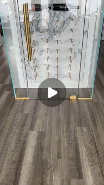 Curt Dahl on Instagram: "Low profile, glass enclosed, backlit stone, custom wine cabinet. This is so clean and sexy with polished brass hardware and backlit onyx. The pegs are two bottles deep and allow easy storage and accessibility to your wines as well as seeing all of the labels…perfect for city apartments and shore homes…what can we build for you? #josephandcurtis #builtbyjosephandcurtis #wine #winecellardesigner #winestorage #winecollector #winecollection #wineenthusiast #winespectator #winelife #winelover #archdigest #architecture #architect #architecturelovers #sommlife #sommelier #foodie #interior #interiordecor #interiorstyling #interiordesigner #interiordecoration #luxury #luxurylifestyle #luxuryhome #moderndecor #moderndesign #modernhome #luxuryinteriors" Residential Wine Wall, Backlit Wine Wall, Backlit Marble Wall, Wine Cabinet Open Stiarcase Wall, Onxy Backlit Bar, Custom Wine Cabinet, Wine Wall, Wine Collection, City Apartment