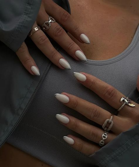 Your metallic manicure moment has arrived ✨. Check out our collection of mod chrome nail designs--featuring these milky white chrome nails with metallic silver French tips--for tons of chic chrome nail inspo! White Chrome Nails, Kutek Disney, Pink Chrome Nails, Chrome Nail Art, Milky Nails, Chrome Nails Designs, October Nails, Chrome Nail, Nagel Tips