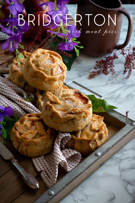 Bridgerton: Pork Meat Pies - Feast of Starlight Midevil Food Ideas, Ren Faire Food, Hobbit Desserts, Bookish Recipes, Savory Strudel, Whimsical Recipes, Bridgerton Food, Dnd Recipes, Bridgerton Recipes