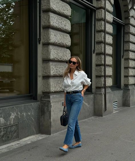 The Jeans-and-a-Button-Down Outfit European Women Wear Nonstop | Who What Wear How To Wear Wide Leg Jeans, Jean Shirt Outfits, Wide Leg Jeans Outfits, Easy E, Button Down Outfit, Wide Leg Jeans Outfit, Cool Outfit Ideas, Blue Button Down Shirt, Blue Jean Outfits