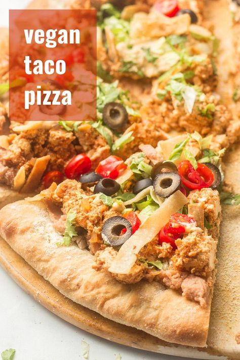 Switch things up for your next taco night, with this scrumptious vegan taco pizza! Piled with hearty refried beans, zesty tofu crumbles, creamy cashew queso, and your favorite taco toppings… Tofu Crumbles, Meatless Meatloaf, Cashew Queso, Vegan Pizza Recipe, Taco Toppings, Vegetarian Meatballs, Vegan Taco, Vegan Entree, Taco Pizza