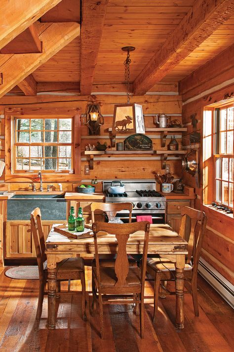 With an efficient kitchen, utilitarian furnishings, and a tiny footprint, simplicity rules the day at the Hannas’ cabin. #kitchen #logcabin #montana #cabins #cozy Jack Hanna, Small Cabin Interiors, Cabin Getaway, Log Cabin Interior, Small Log Cabin, Building A Cabin, Cabin Kitchens, Cabin Interiors, Getaway Cabins