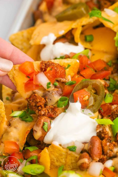 Cheesy and delicious Loaded Ground Beef Nachos are simple to make with seasoned beef, nacho cheese sauce, and all of your favorite toppings. Beefy Cheesy Nachos, Superbowl Nachos, Ground Beef Nachos, Nacho Grande, Beef Nachos, Nacho Toppings, Cheesy Nachos, Little Sunny Kitchen, Homemade Cheese Sauce