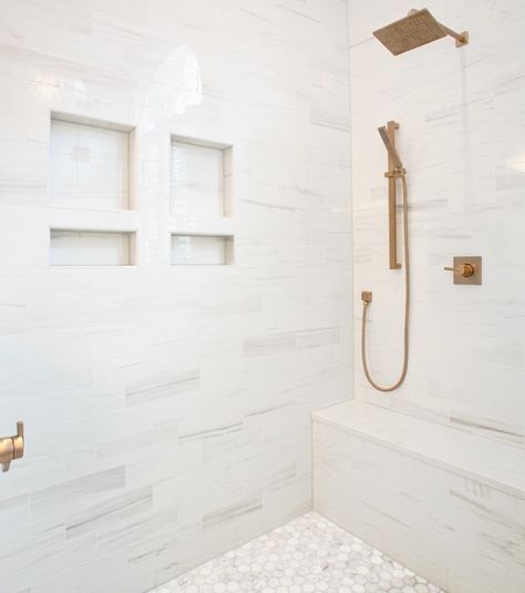 If there's a room that deserves a little luxury, it's the bathroom. Take a seat and enjoy a built-in shower bench. Longer showers just got better! #dreamhomedesign #customdesigns #interiorideas #interiordesignnc #bathroomremodel Two Shower Niches, Shower Bench Built In, Bathroom Seat, Spa Like Bathrooms, Luxurious Showers, Shower Seat, Basement Makeover, Shower Bench, Shower Niche