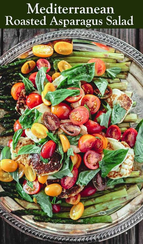 BEST roasted asparagus salad with tomatoes, basil, and a lightly sherry vinaigrette! Make this show-stopping dish #vegan or add halloumi or Greek feta for a twist! Grab recipe and tips on themediterraneandish.com #asparagus #roastedasparagus #mediterraneanfood #mediterraneanrecipes #mediterraneandiet #glutenfree Roasted Salad, Salad With Tomatoes, Fried Halloumi, Halloumi Cheese, Asparagus Salad, Mediterranean Salad, Roasted Asparagus, Mediterranean Dishes, Healthy Pumpkin