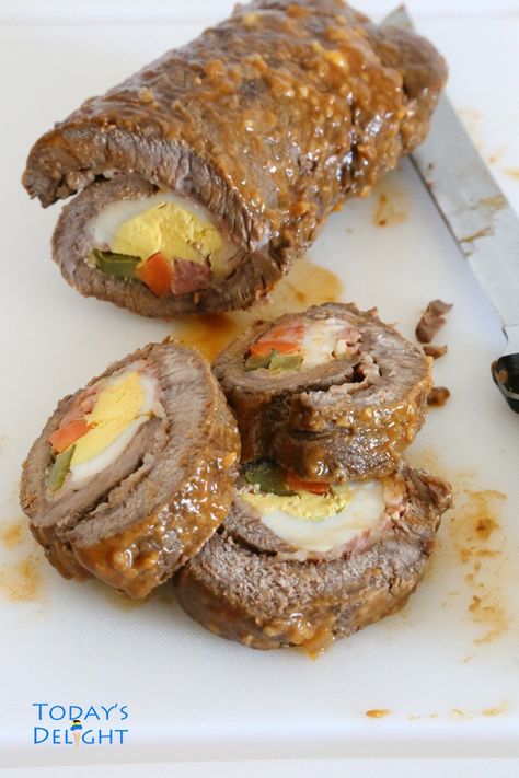 Morcon recipe is a savory Filipino beef roll with fillings such as bacon, sausages or hotdogs, hard boiled eggs, sweet pickles or dill and carrots. December Food, New Year's Eve Food, Pickled Sausage, Filipino Recipe, Pinoy Recipes, Beef Roll, New Years Eve Food, New Years Eve Dinner, Potted Beef