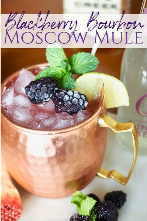 This refreshing Blackberry Bourbon Moscow Mule is a fun twist on the classic mule. With fresh smashed blackberry's, good bourbon, fresh lime and ginger beer this cocktail is easy and beautiful. #thefreshcooky #cocktail #recipe #blackberries #moscowmule #mocktail Keto Lemon Poppyseed, Blackberry Bourbon, Blackberry Cocktail, Easter Drink, Poppyseed Muffins, Mule Cocktail, Fall Drink, Natural Recipes, Christmas Drink