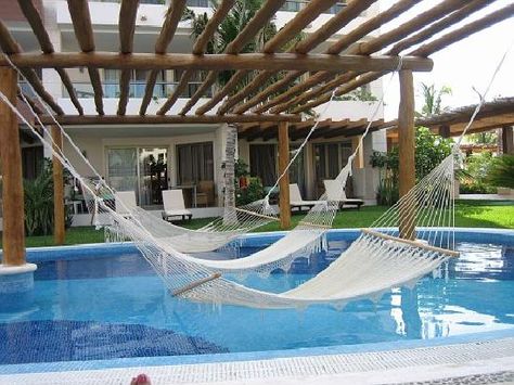 Swings Over Pool, Unique Pools, Excellence Playa Mujeres, Pool Plans, Miami House, White Farmhouse Exterior, Pool Bed, Villa Ideas, Poolside Decor