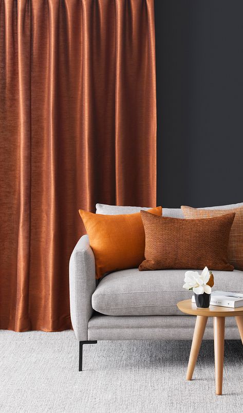 A curtain in Silk Road ‘Copper’ from James Dunlop and wall in Resene Foundry makes for a delicious luxe room set. The duplon silk texture of the fabric gives it that textural ‘oomph’. Copper Curtains, Raw Silk Fabric With Traditional Drape, Raw Silk Curtains, Cognac Sofa Fabric, Orange Linen Curtains, Sheer Terracotta Curtains, Living Room Designs India, Bedroom Red, Rustic Curtains