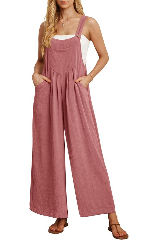 PRICES MAY VARY. Breathable Material：100% Polyester. The wide-leg jumpsuit overall pants are for women that are not see-through, Super soft, Lightweight, flowy, and skin-friendly, feeling comfortable and cool. Stylish and comfortable： Wide Leg jumpsuit bib with Pockets are a perfect combination of style comfortable pant and adjustable strap with buttons,sleeveless, loose casual fit with pockets Versatile and practical： This jumpsuits are perfect for a wide range of activities, including daily li Romper Pants Outfit, Pant Romper Outfit, Wide Leg Overalls, Womens Summer Jumpsuits, Summer Jumpsuits, Overall Pants, Loose Romper, Overalls Casual, Wide Leg Romper