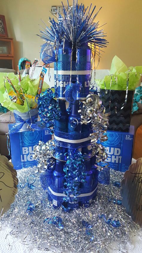 Bud light beer cake Budlight Beer Gift Ideas, Bud Light Beer Cake, Budlight Beer Cake, Bud Light Birthday, Beer Bottle Centerpieces, Beer Birthday Party, Bud Light Beer, Lighted Centerpieces, Basket Diy