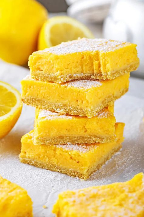 These keto lemon bars are sweet and tangy with a refreshing flavor, all on a shortbread crust. You won't believe each square of these low carb lemon bars have only 2.8 NET CARBS. And this keto lemon bars recipe is super easy to make! Lemon Bar Recipes, Sugar Free Lemon Bars, Low Carb Lemon Bars, Keto Lemon Bars, Sugar Free Condensed Milk, Sugar Foods, Gluten Free Lemon Bars, Keto Bars, Lemon Bars Recipe