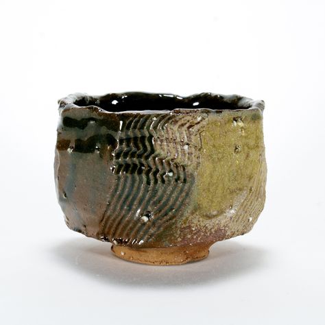 Rustic Green Stoneware Chawan with Feldspar Inclusions Cone 6 Oxidation 4.25" x 4.25" x 3.5" This chawan was handbuilt using the kurinuki method of carving objects out of a solid piece of clay.  This handcrafted stoneware tea bowl is made of iron bearing clay, and is fired up to Cone 6 (about 2220F, 1220C) in electric oxidation. This clay is completely vitrified at this temperature an can safely be microwaved and washed in the dishwasher. Due to the handcrafted nature of this object, minor variations in size, shape, and surface decoration will occur. Pottery Glaze, Surface Decoration, Tea Bowl, Ceramics Pottery Art, Matcha Tea, Pottery Pieces, Japanese Tea, Tea Bowls, Ceramic Cups