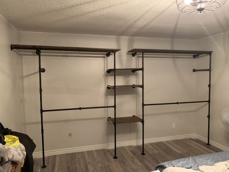 Industrial Pipe Closet Shelf, Industrial Pipe Closet Ideas, Industrial Farmhouse Closet, Closet Without A Closet, Open Wall Closet Ideas Bedroom, Basement Walk In Closet, Industrial Walk In Closet, Open Concept Closet In Bedroom, Homemade Closet Ideas