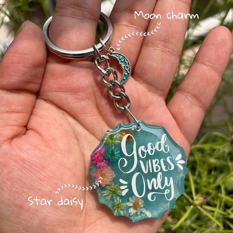 Resin keychain with moon charm ₹400 free shipping Resin Frame, Resin Keychain, Resin Jewellery, Moon Charm, Resin Jewelry, Resin Crafts, Resin Art, Daisy, Moon