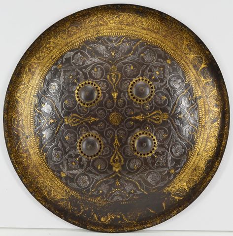 Indian shield, 17th century, steel, gold, textile, Diam. 19 1/4 in. (49 cm), Met Museum. Persian Shield, History Jewelry, Art Foundation, Historical Armor, Larp Costume, Fantasy Miniatures, Moon Knight, Museum Collection, Metropolitan Museum Of Art