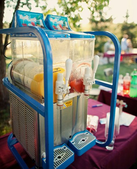 7-11 Slushy Bar  Having an outdoor event in the heat? There’s nothing like a cool and refreshing “Big Gulp” to pick you up on a hot day. Consider renting a slushy machine…trust us, your guests won’t be able to resist slurping these down. Slushy Machine, Margarita Bar, Frozen Summer, Food Bars, Reception Food, Wedding Reception Food, Food Stations, Wedding Countdown, Party Bars