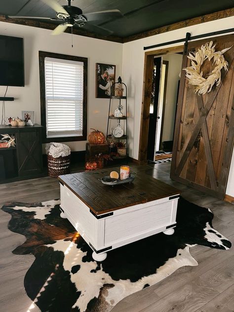 Cow Hide Living Room Decor, Western Home Remodel Ideas, Black Western Home Decor, Western Interior Design Living Room, Dark Western Living Room, Western Trailer House Ideas, Rust And Black Living Room, Western Mobile Home, Western Home Decor Ranch Style Living Room