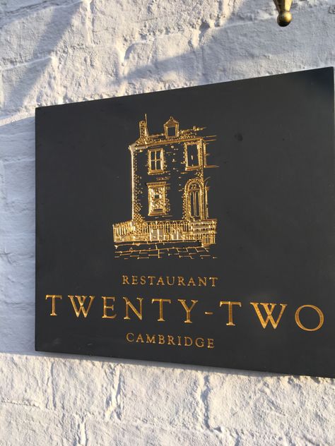 Finest quality Welsh Slate signage, created for Restaurant Twenty-Two in Cambridge, England. Featuring gilded, engraved lettering and etched gilded logo design. Get in touch at hello@stonesign.com to create your bespoke business sign. Luxury Signage Design, Luxury Restaurant Branding, Brass Signage, Stone Signage, Luxury Signage, Estate Signage, Gold Signage, Restaurant Signage, Etched Glass Door