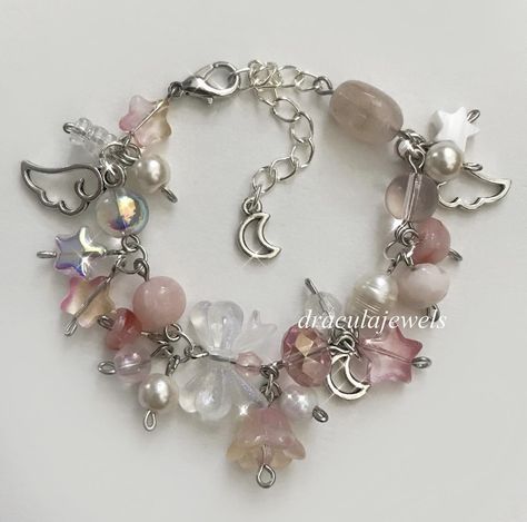 Pink Cute Bracelet, Fairy Bracelet Aesthetic, Cluttered Bracelets, Clutter Bracelet, Clutter Jewelry, Charm Bracelet Ideas, Fairy Bracelets, Bracelet Business, Pink Beaded Bracelet