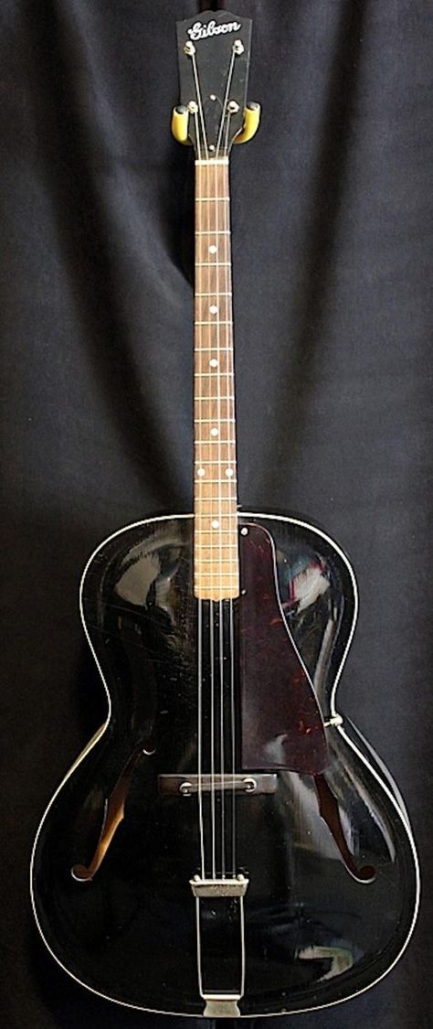 1930s Gibson Special Black tenor guitar --- https://www.pinterest.com/lardyfatboy/ Tenor Guitar, Gibson Guitars, Blues Guitar, Beautiful Guitars, Guitar Building, Custom Guitar, String Instruments, Mandolin, Guitar Chords